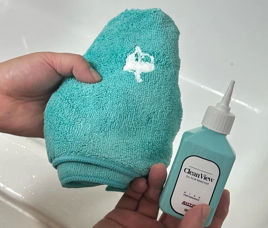Starting bathroom cleaning with AutoGrooming Clean View glass film remover
