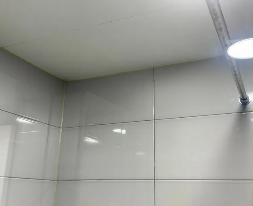 Shower-booth glass after oil-film removal