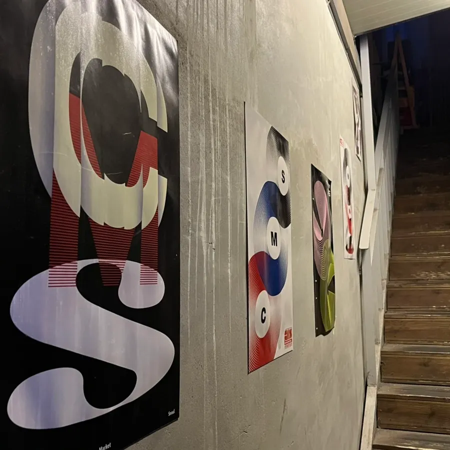 Narrow staircase leading up to CMS Soundbar's second floor