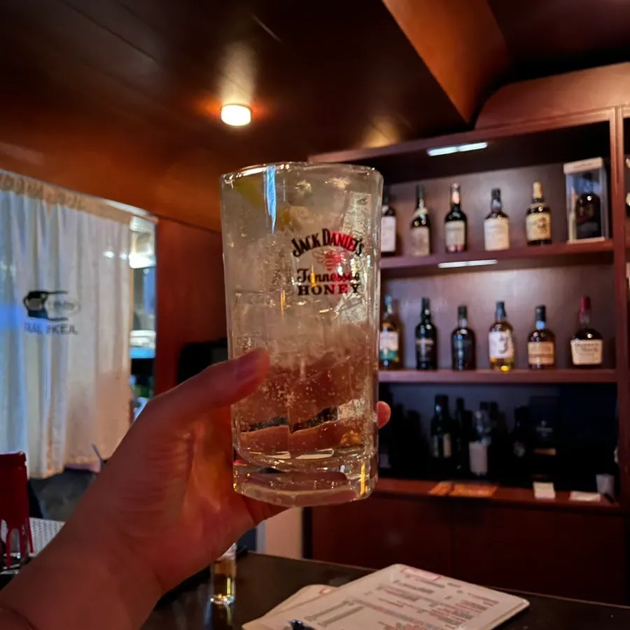 Two highball glasses on the bar table