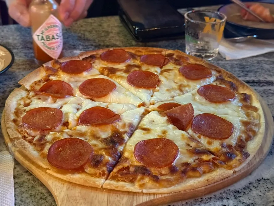 Pepperoni thin pizza loaded with cheese