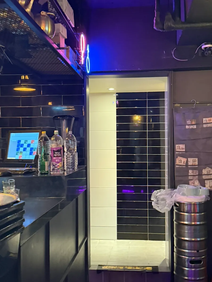 Entrance to the separate men's and women's restrooms inside the restaurant