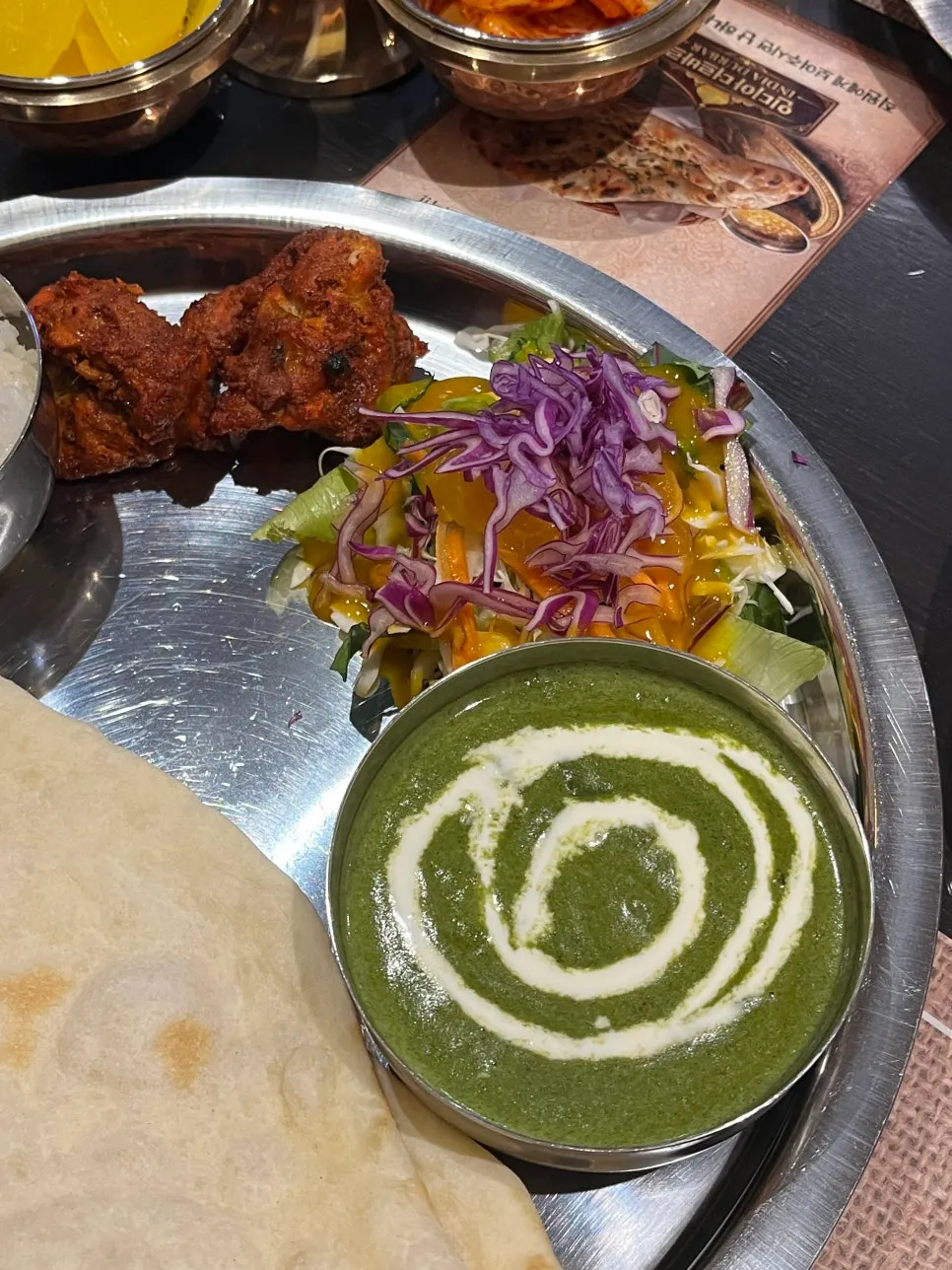 Plate of salad and dressing served with the set