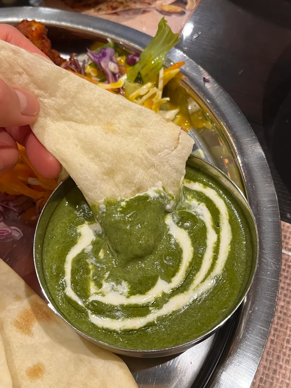Bright green palak paneer curry