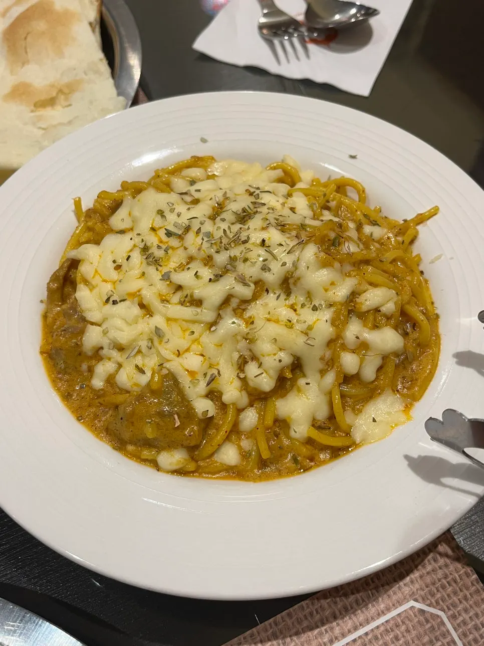 A plate of lamb curry pasta