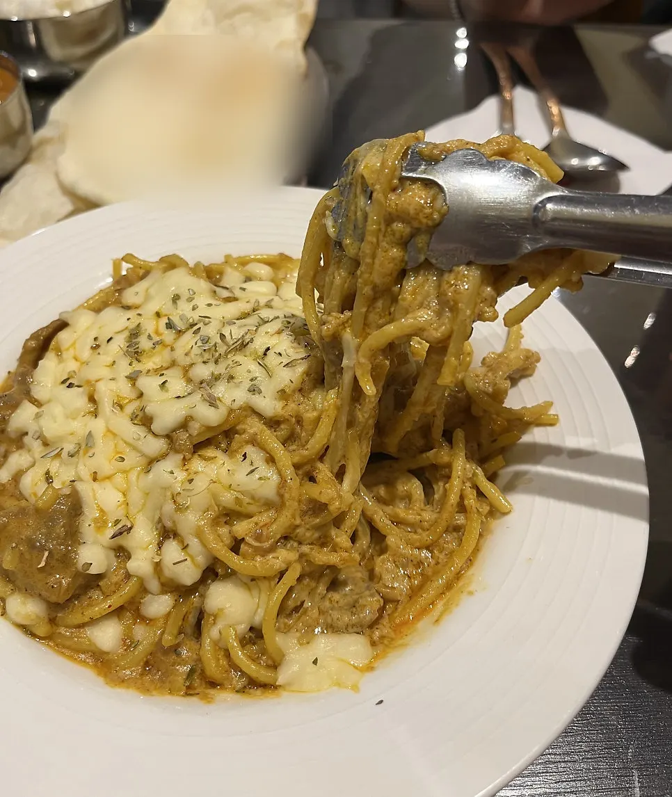 Lamb curry pasta loaded with meat