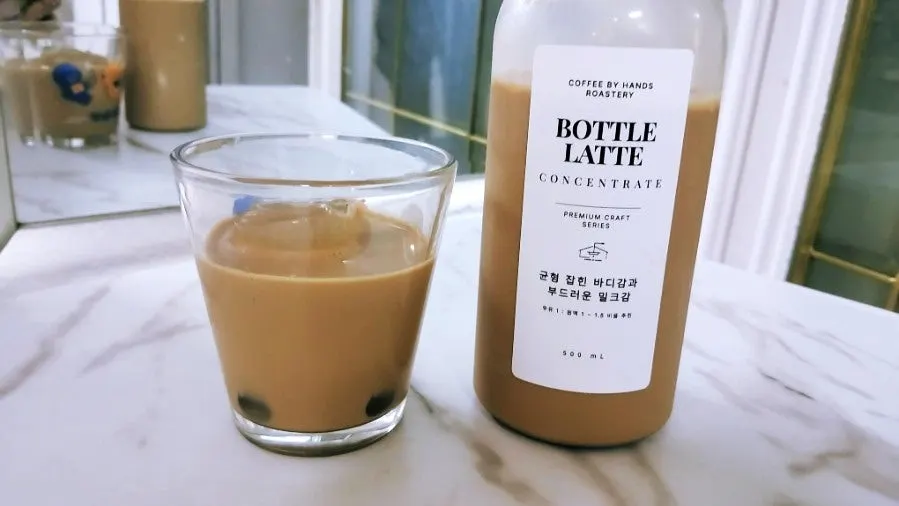 Morning iced latte made at home from the bottle latte