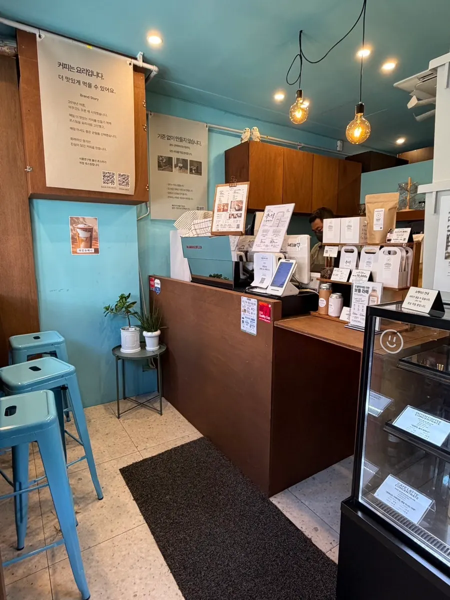 Interior of the cozy takeout café tucked inside the alley