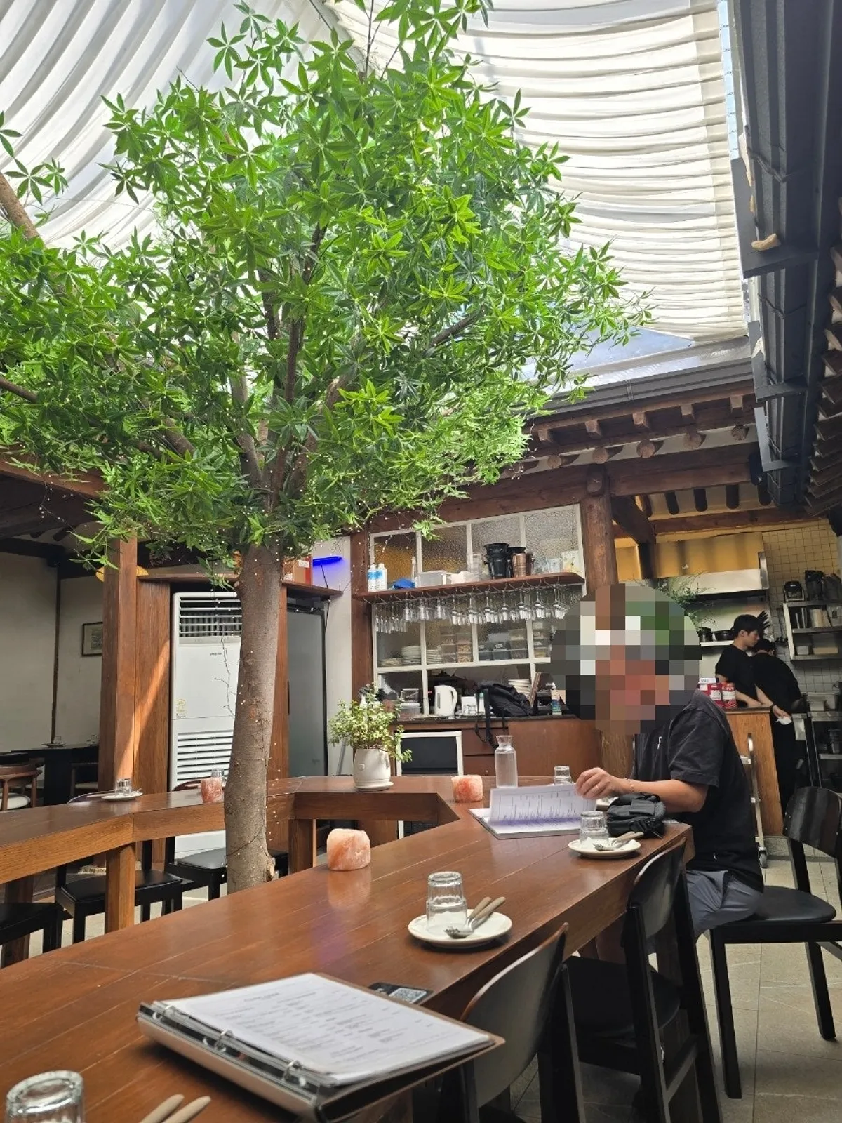 Hanok interior seating atmosphere at Concasse Anguk