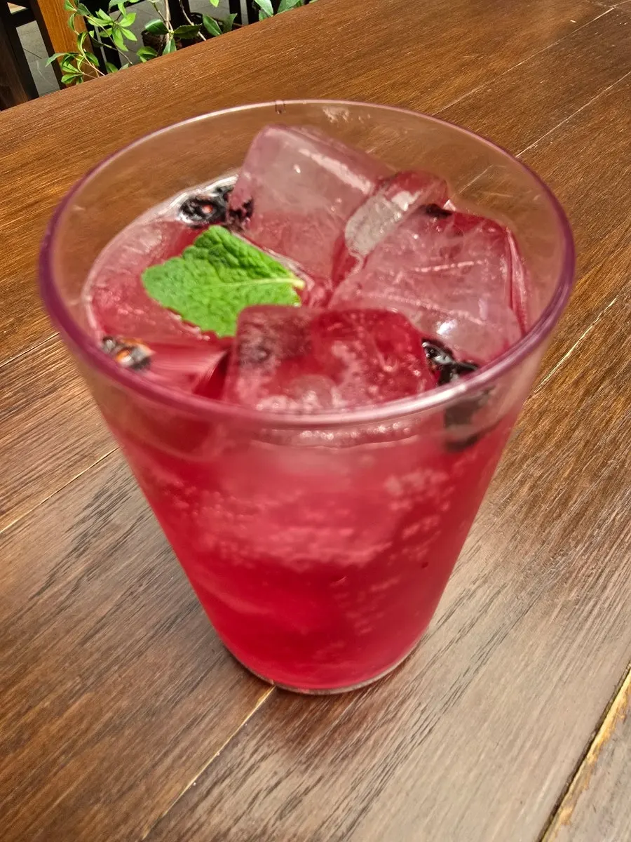 Mungyeong iced omija tea served alongside the lasagna