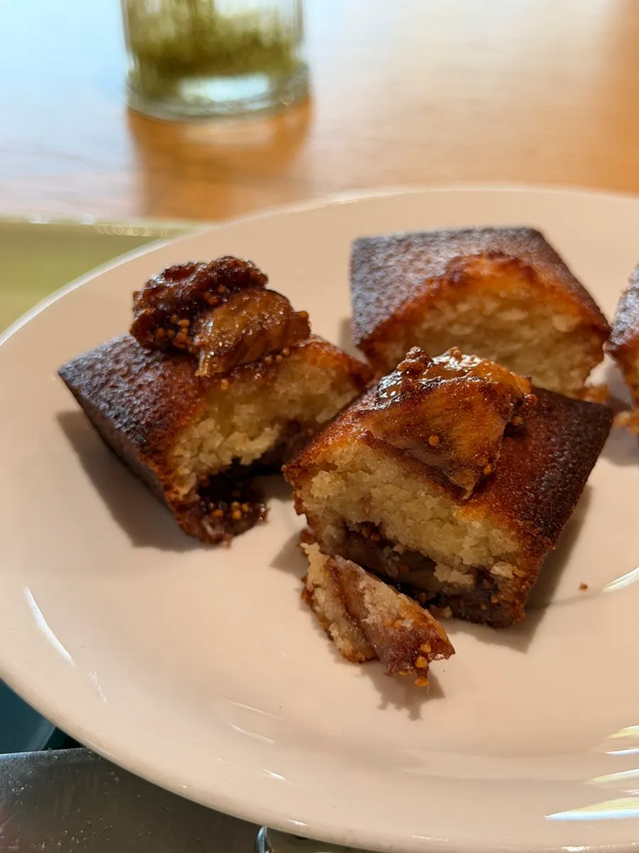 Cross-section of a plain financier showing crisp-outside, moist-inside texture