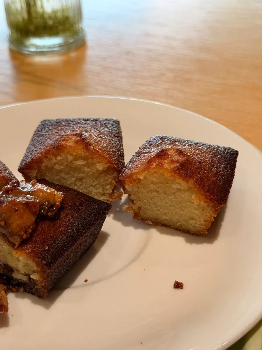 A fig financier with a bite taken out