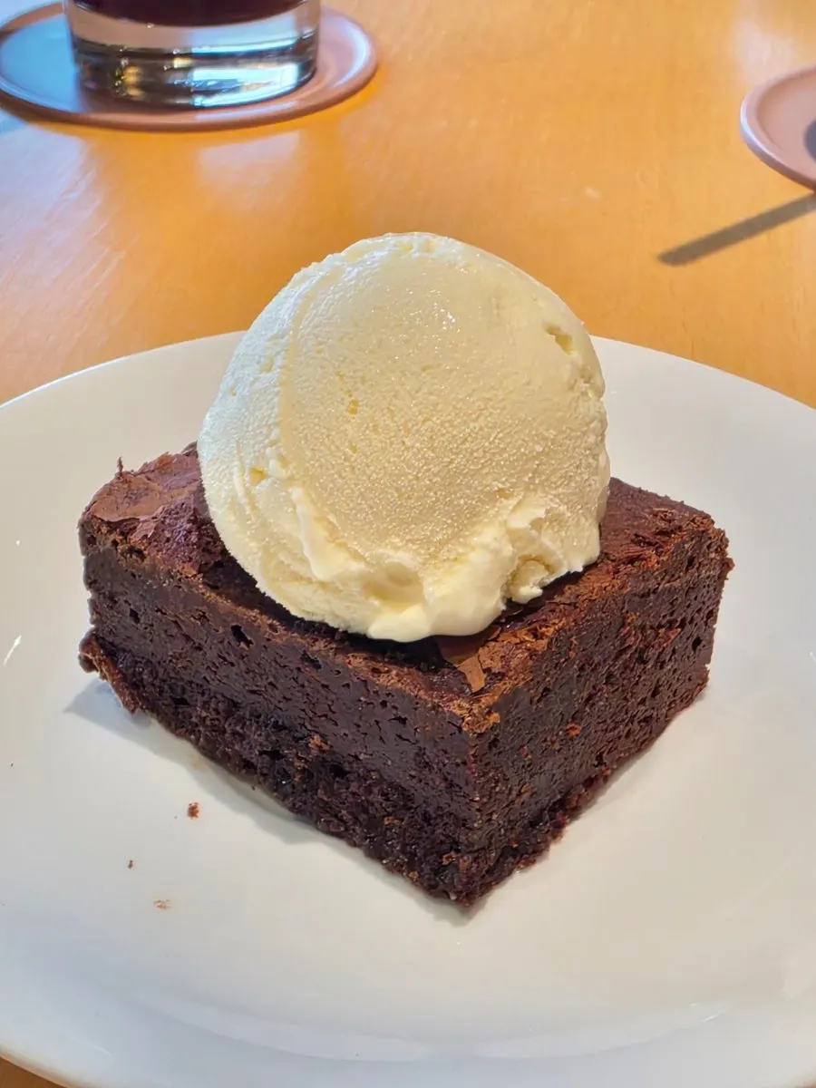 CORR's brownie topped with vanilla ice cream