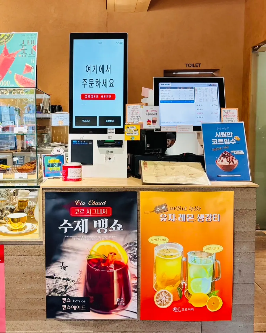 Two cups: iced americano and decaf americano