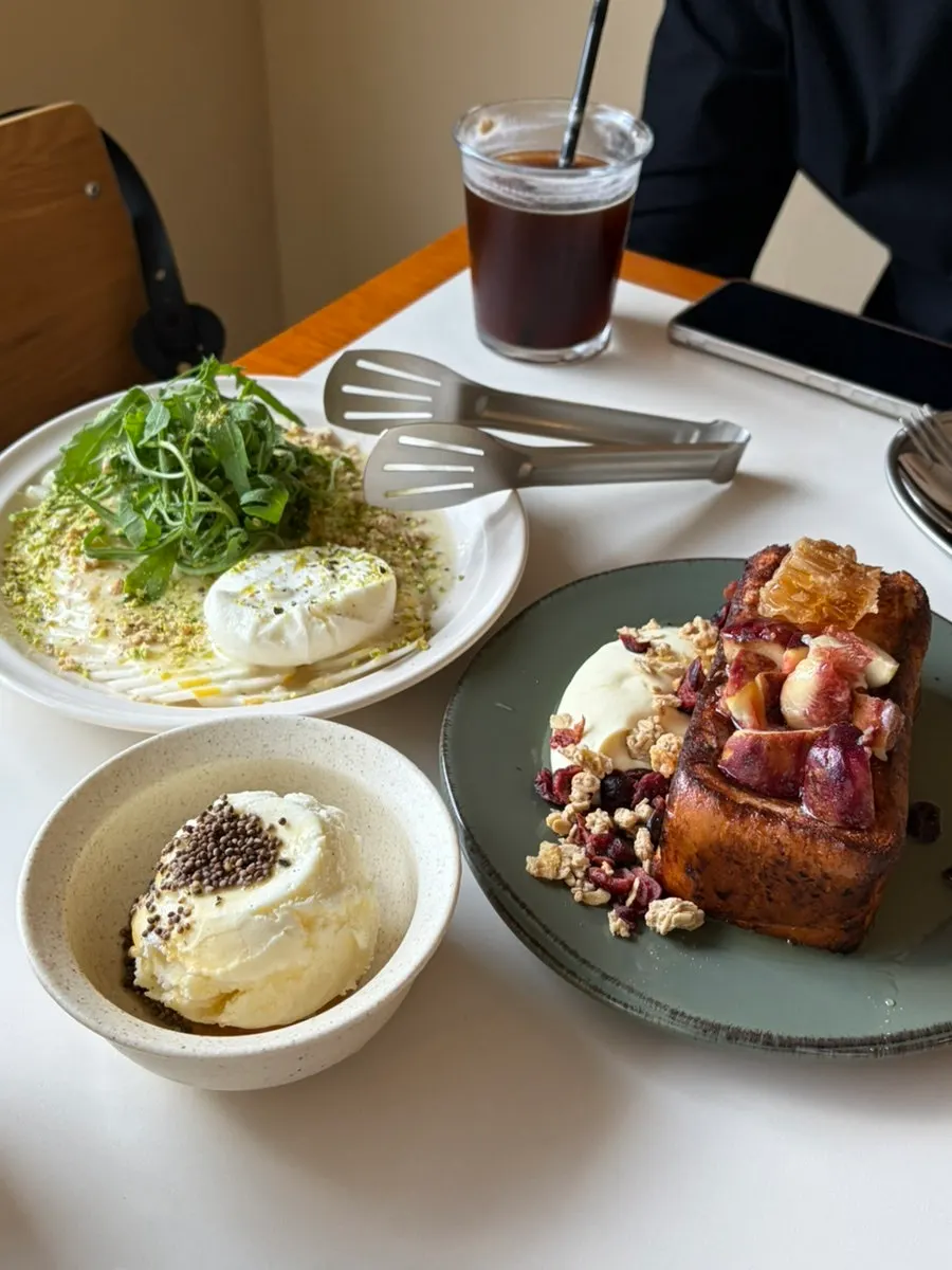 Brunch table set alongside coffee