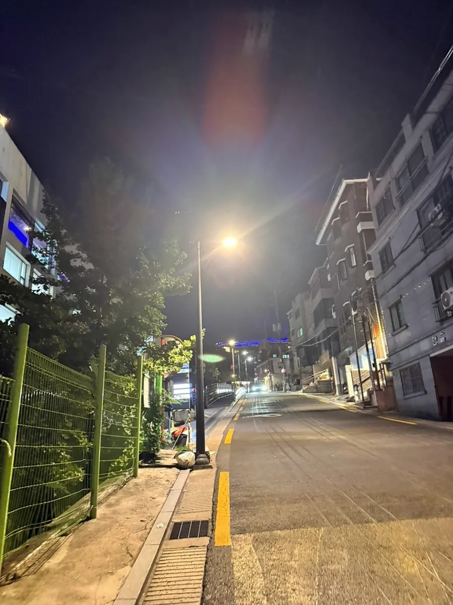 Alley leading to Cove Bar near Sinheung Market in Haebangchon