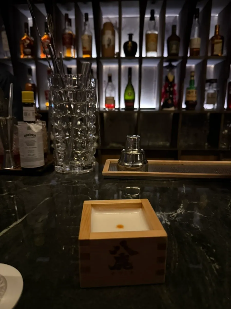 A cocktail resting on the bar table at Cove Bar
