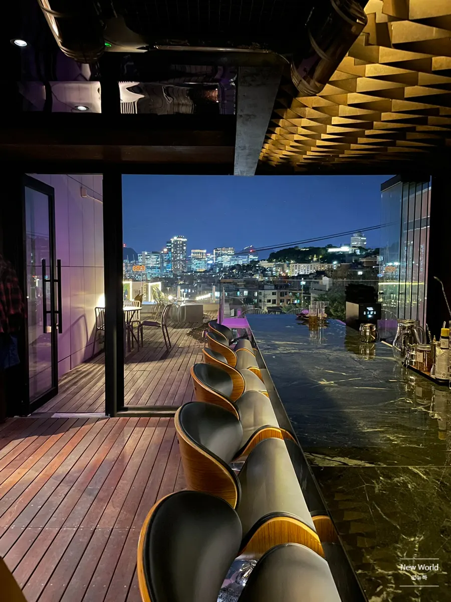 Entrance and interior atmosphere of Cove Bar in Haebangchon