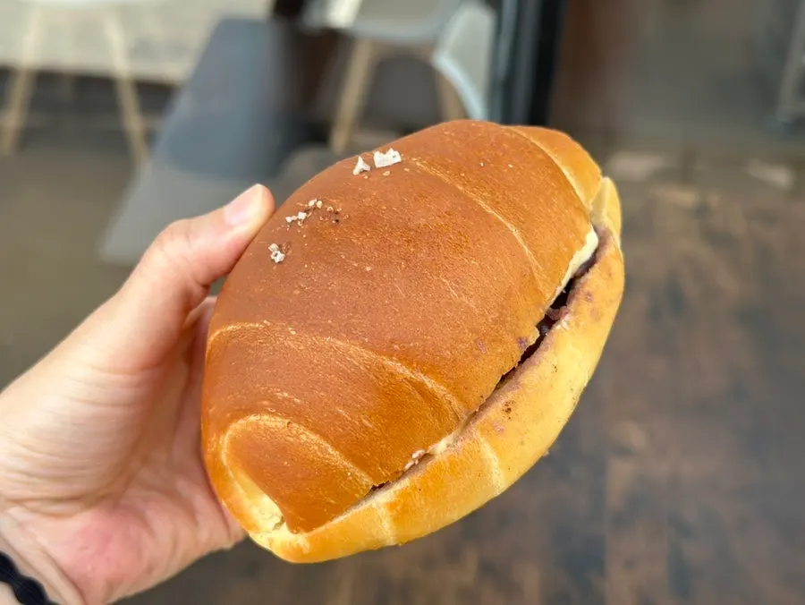 Cross-section of ang-butter salt bread with red bean