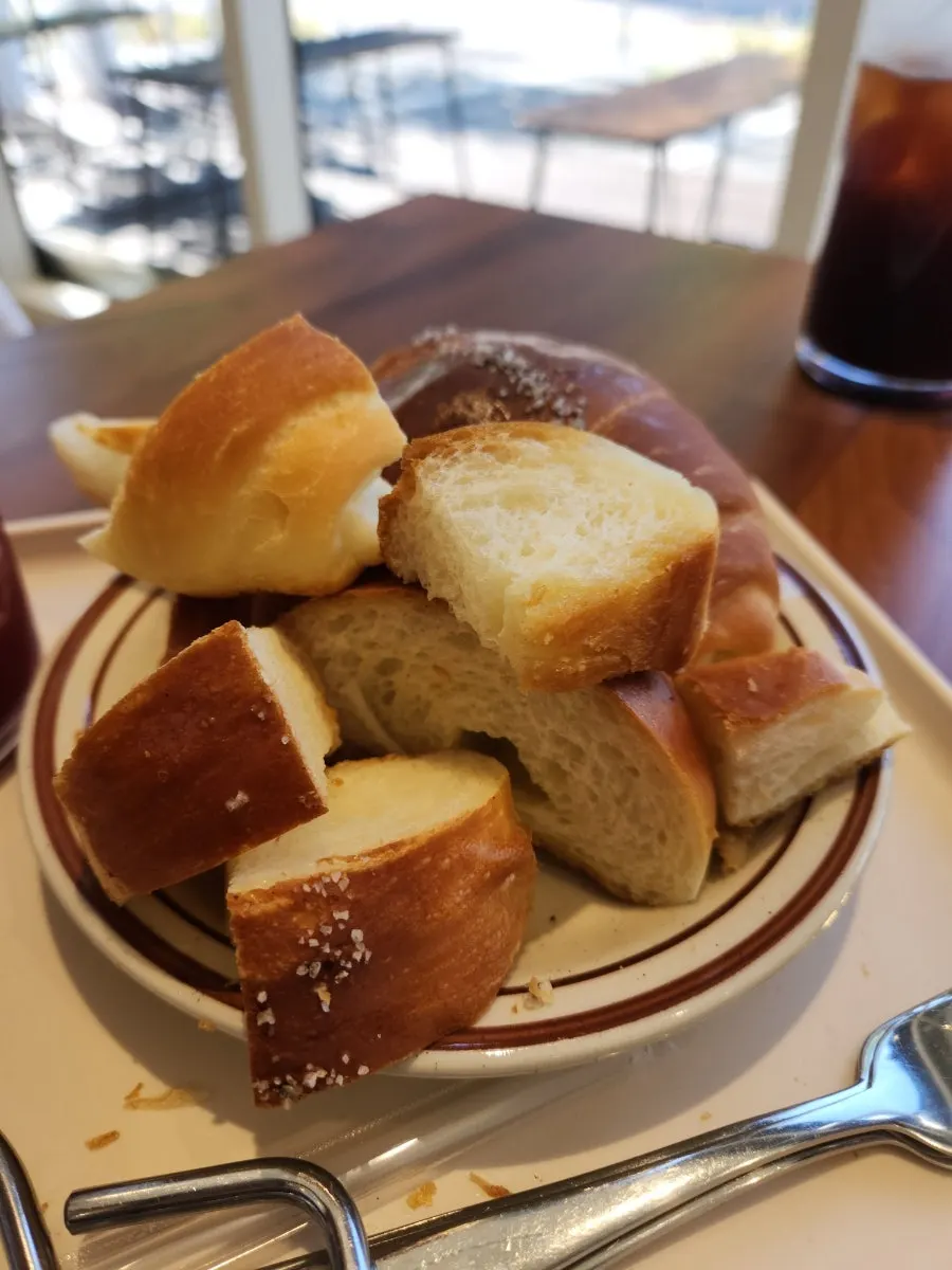 A bite taken out of the freshly baked salt bread