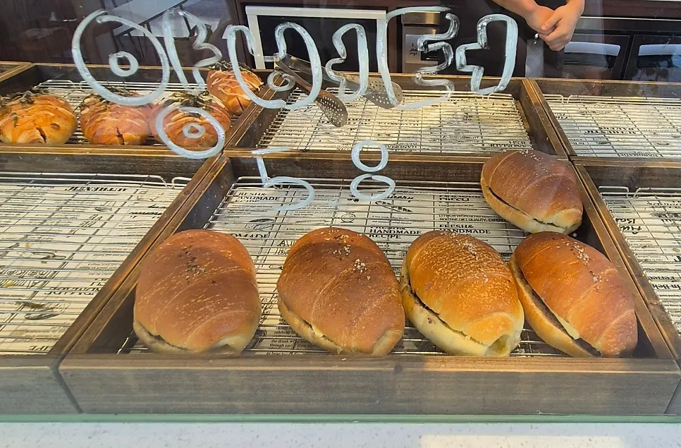 Various types of salt bread displayed at Cozy Bear