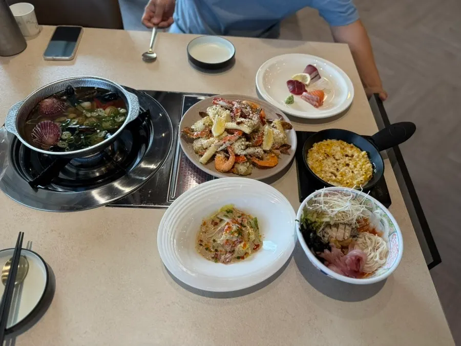 Seafood ilpumyori set with the sea as a backdrop