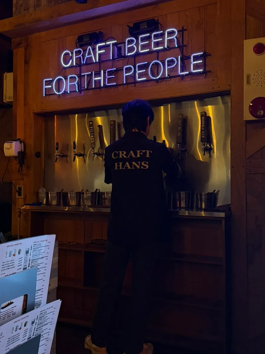 Several draft beer machines lined up