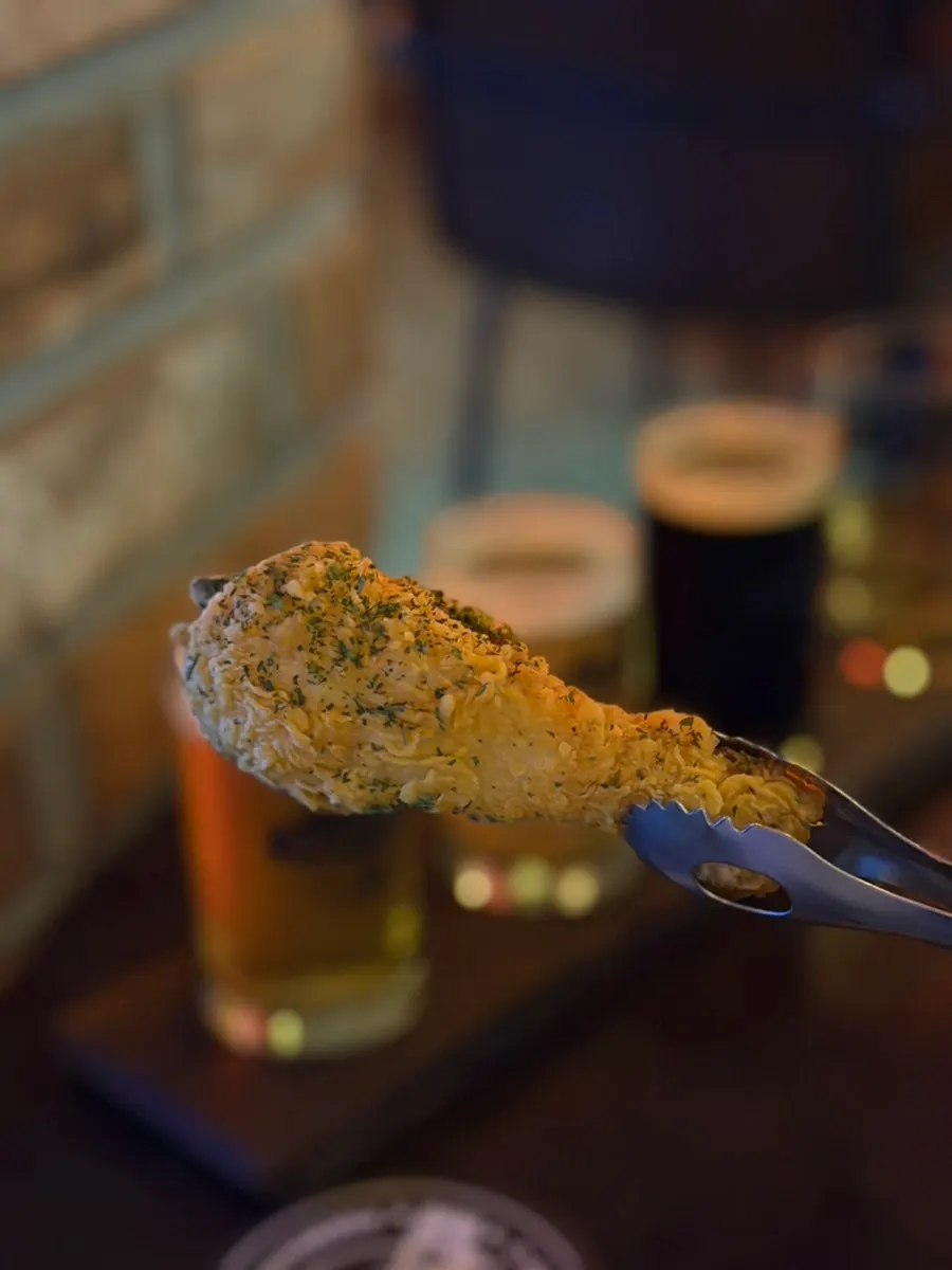 Crispy chicken pieces sprinkled with parsley
