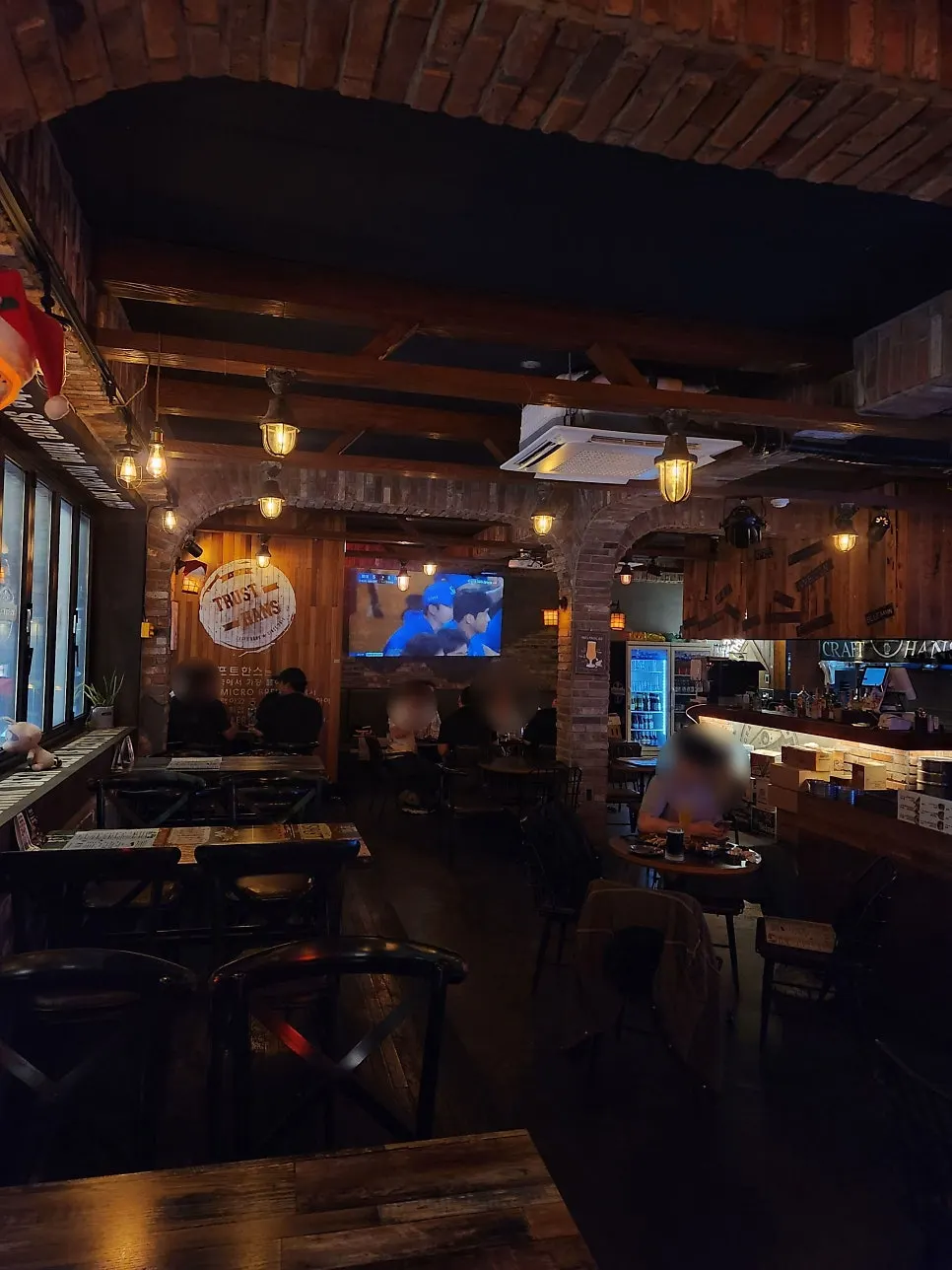 Interior of Craft Hans with wood-tone walls