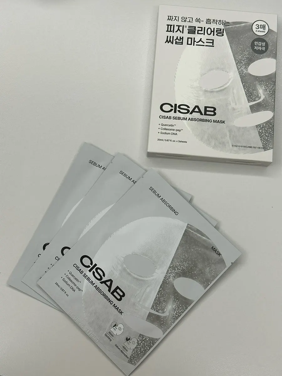 Sebum-absorbing mask sheet taken out and unfolded