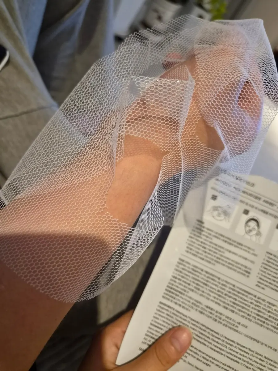 Mask sheet with one side cover peeled off