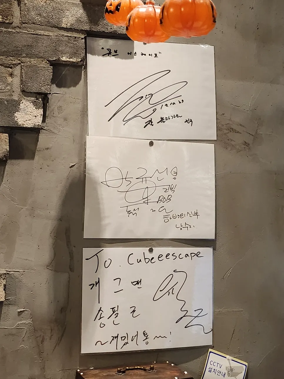 Celebrity autographs hanging on the store wall