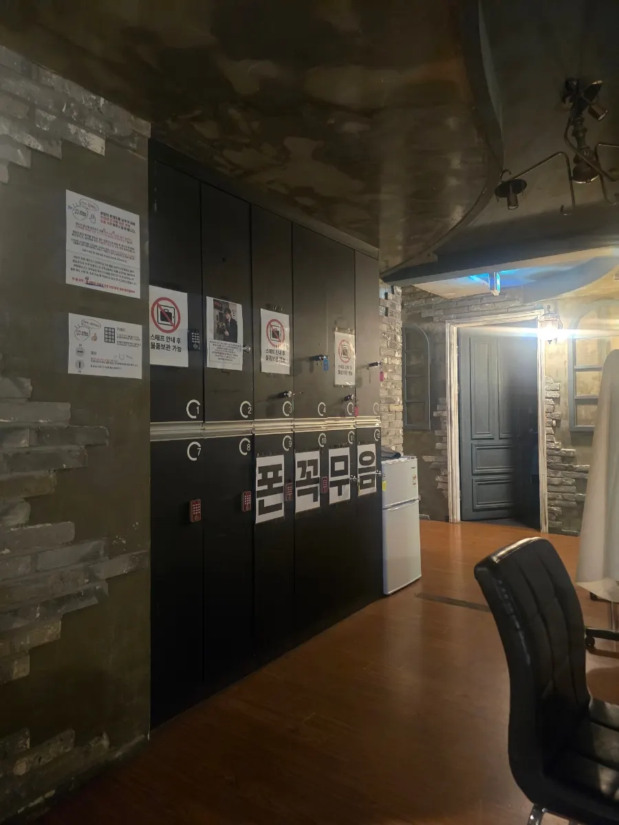 Storage lockers for electronics before entering the room