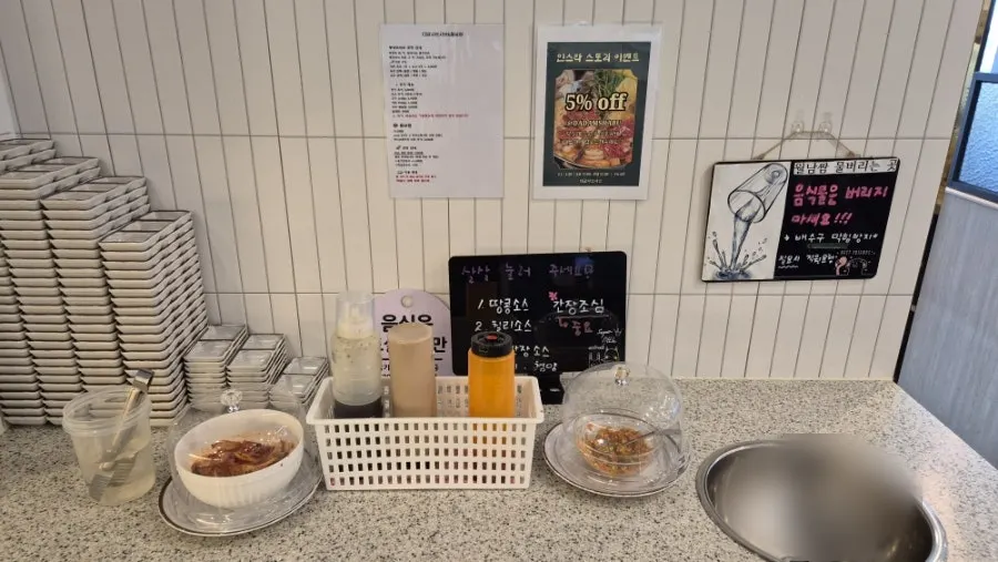 Fried rice ingredient corner with raw egg, rice, seaweed flakes and sesame oil