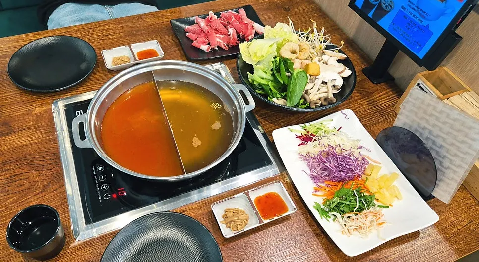 Plate piled high with vegetables and sides
