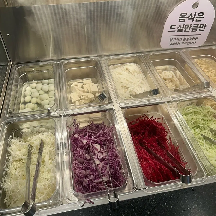 Rice paper wrap topped with vegetables and meat