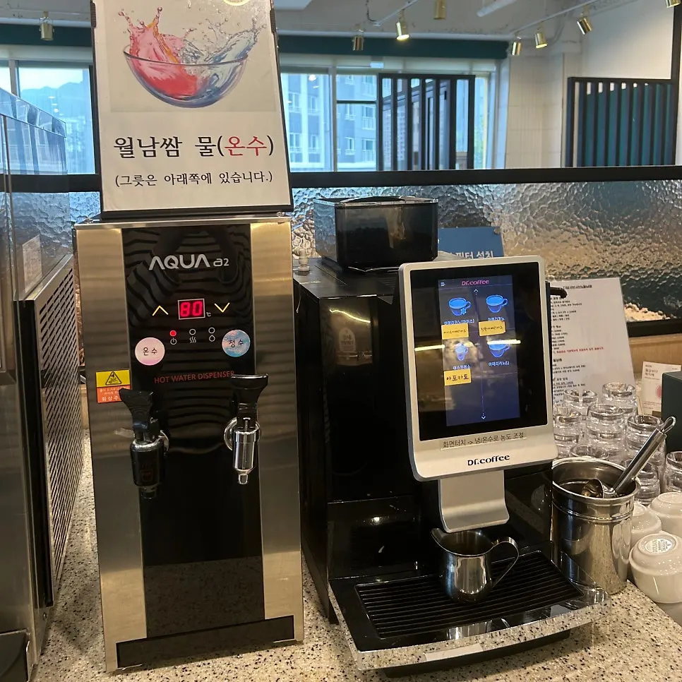 Self-serve coffee machine at the dessert corner
