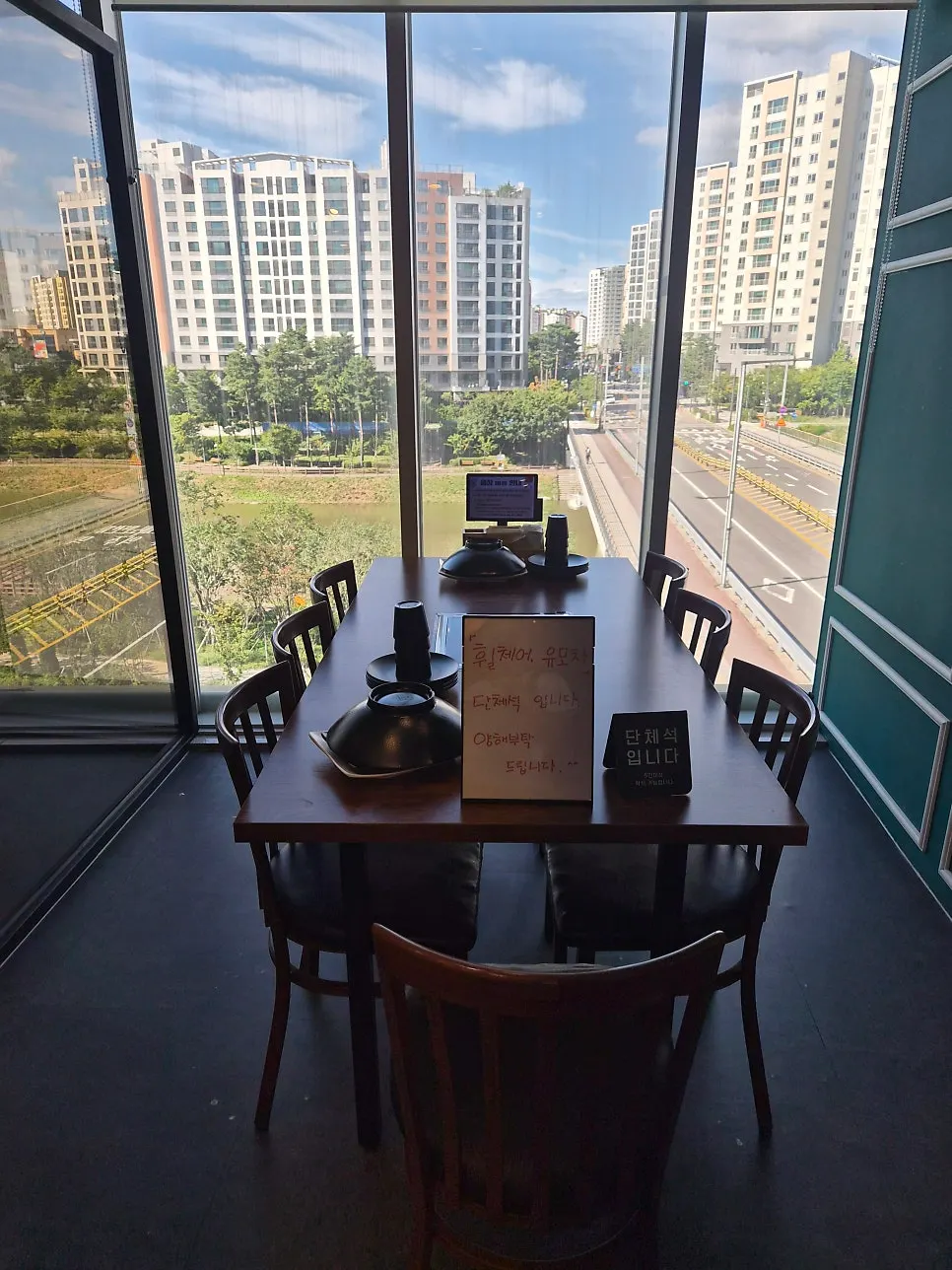 Glass-partitioned seating area for more privacy