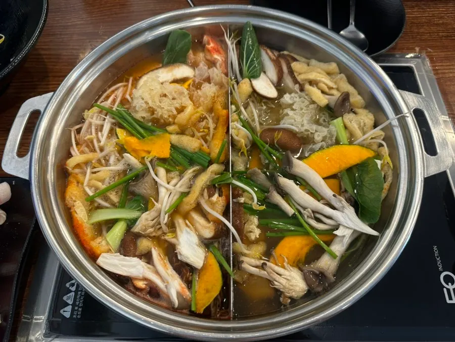 Bowl of hot water for soaking rice paper
