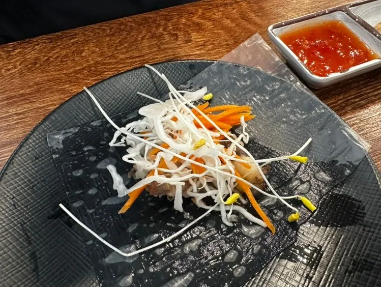 Shabu-shabu boiling with vegetables piled in
