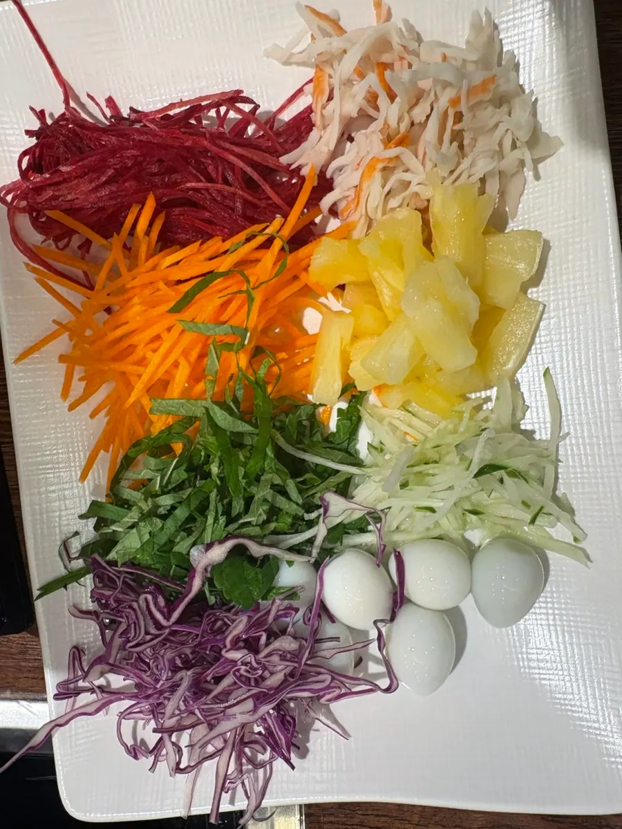 A Vietnamese wrap rolled with pineapple inside