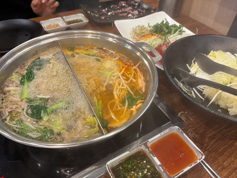 Table spread of boiling shabu-shabu and wolnamssam