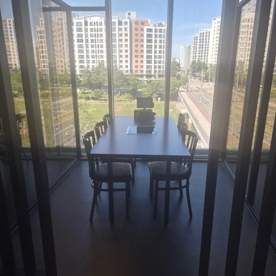 Spacious interior with partitioned group rooms