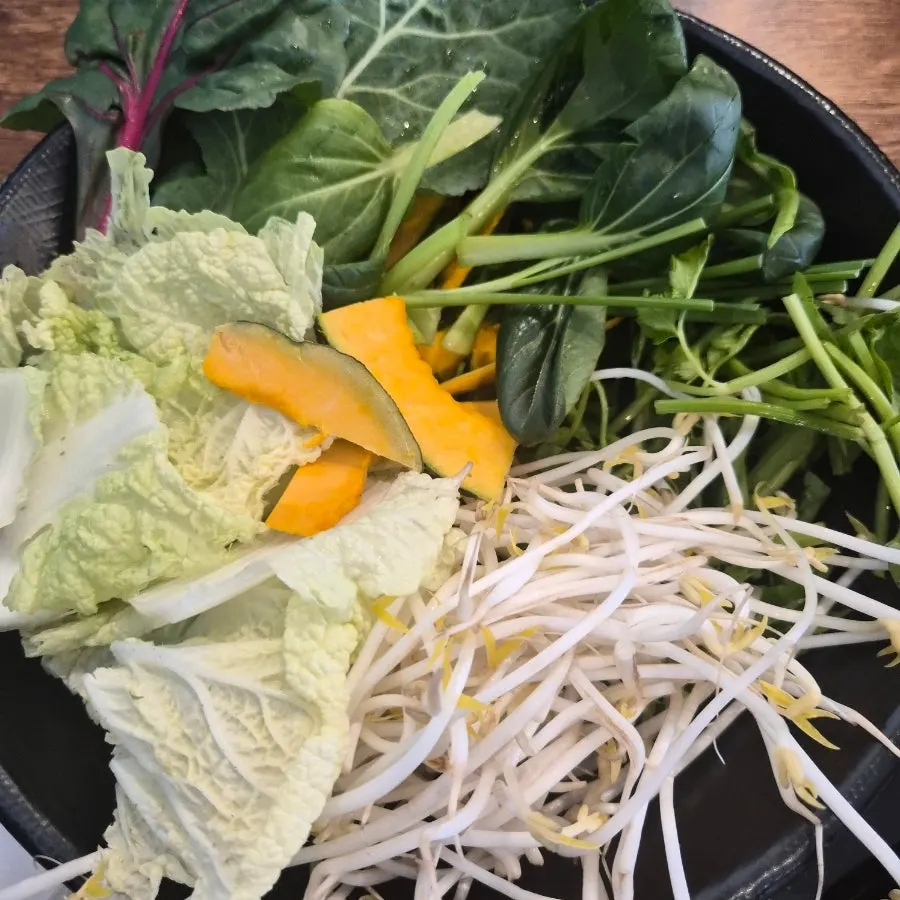 Fresh vegetables laid out at the self-bar