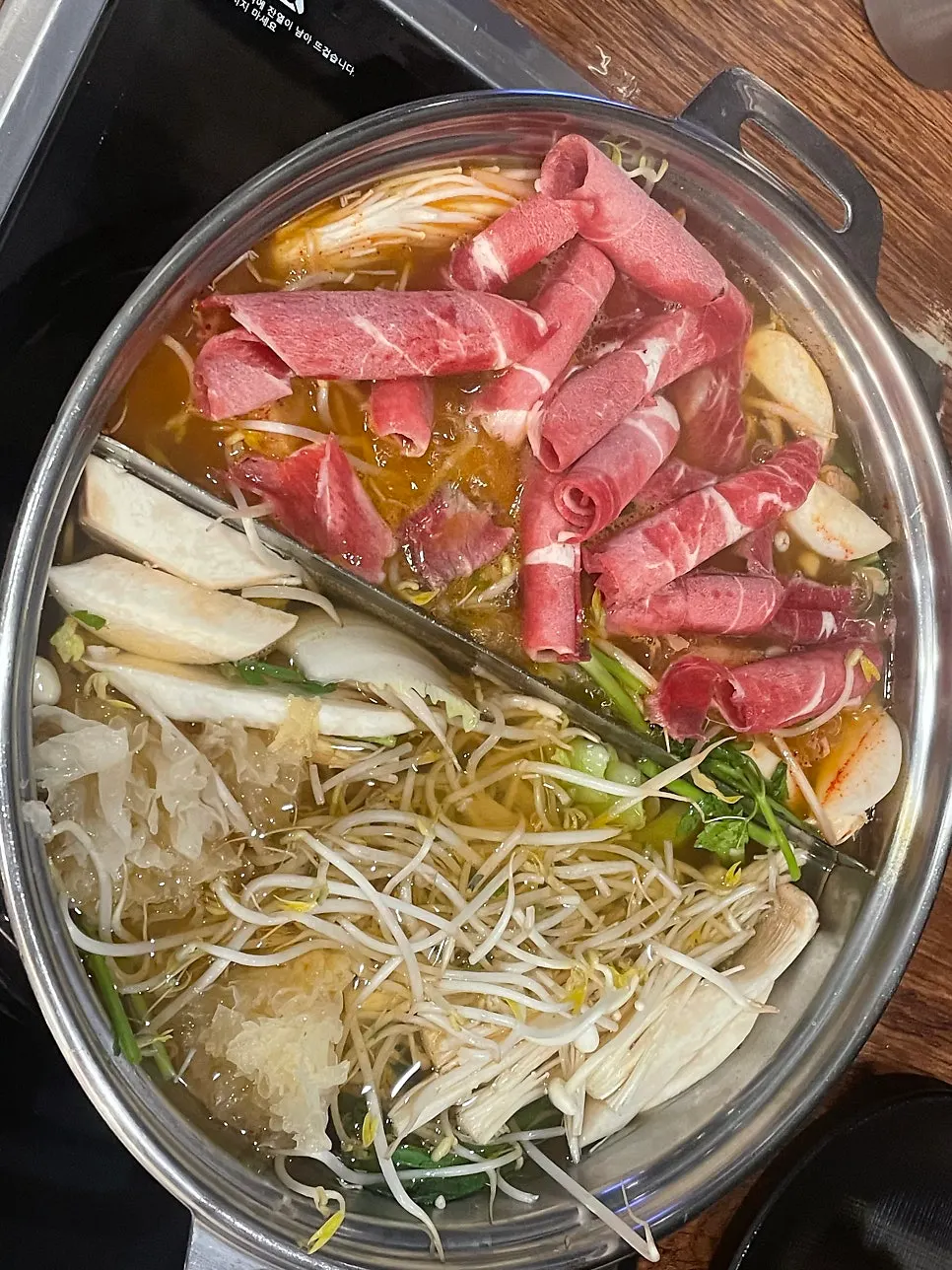 Thinly sliced shabu-shabu meat served on a plate