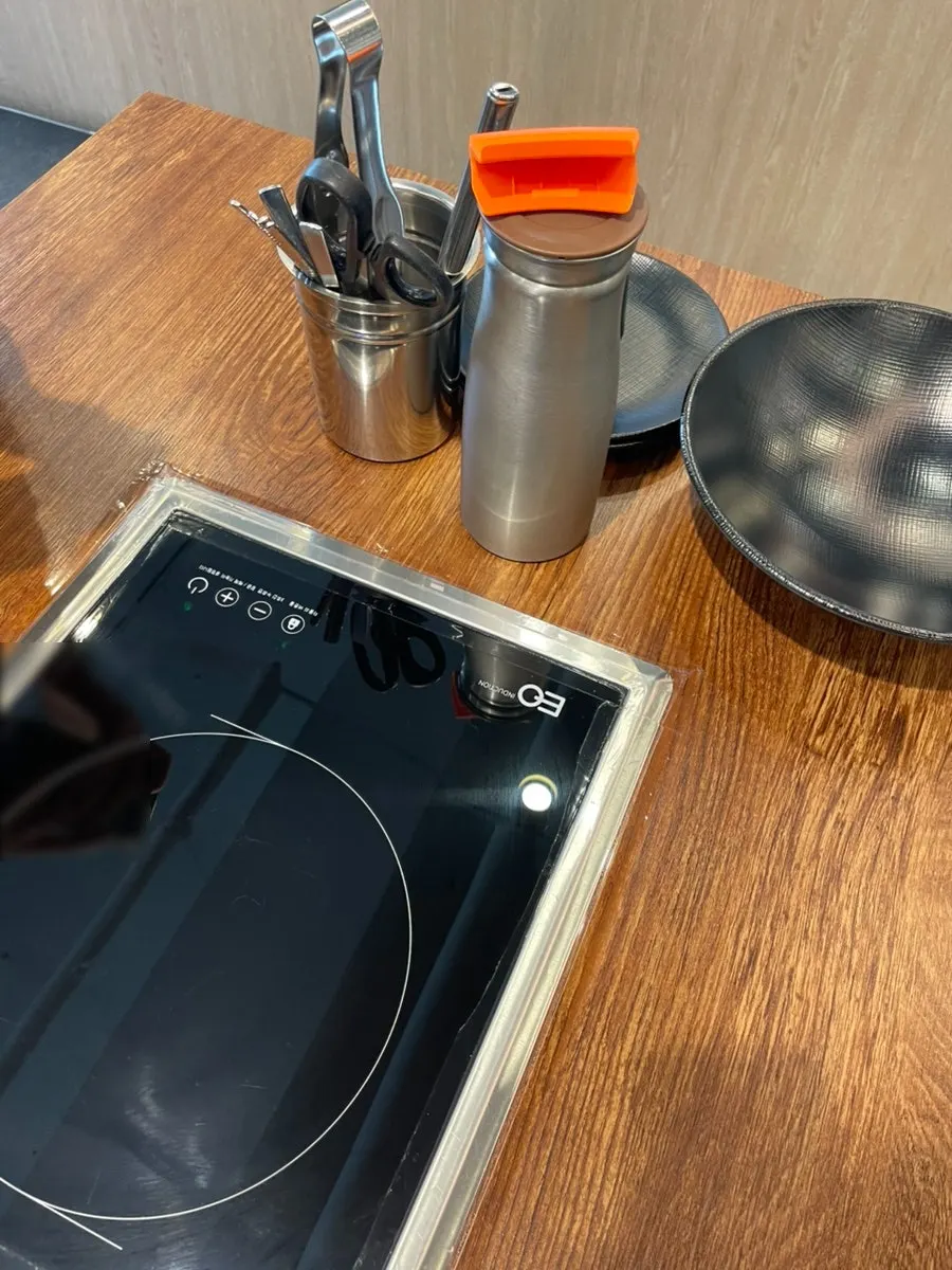 Basic table setting with plates, utensils, and water