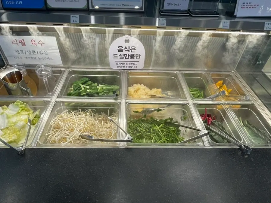 Sauce station with peanut sauce, chili sauce, and more