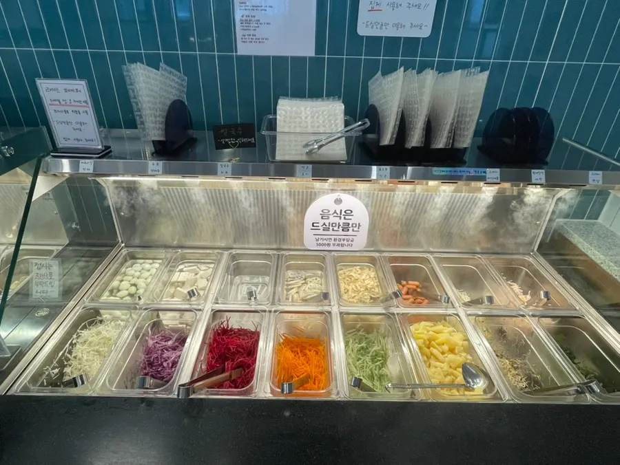 Station with rice, eggs, and gim flakes for fried rice or porridge