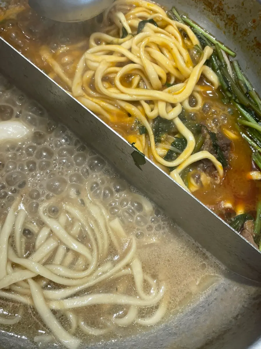 Shabu-shabu pot before adding kalguksu noodles