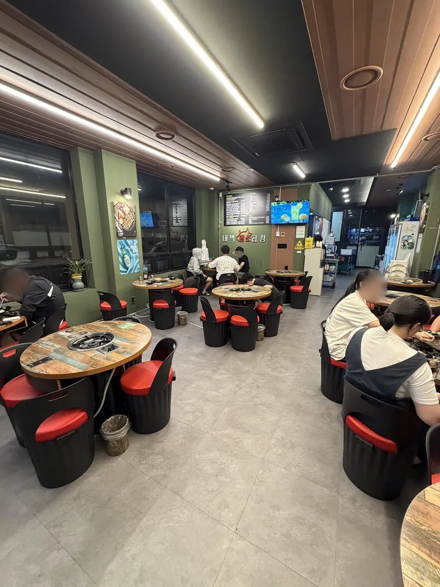 Interior of the gopchang restaurant with roomy table spacing